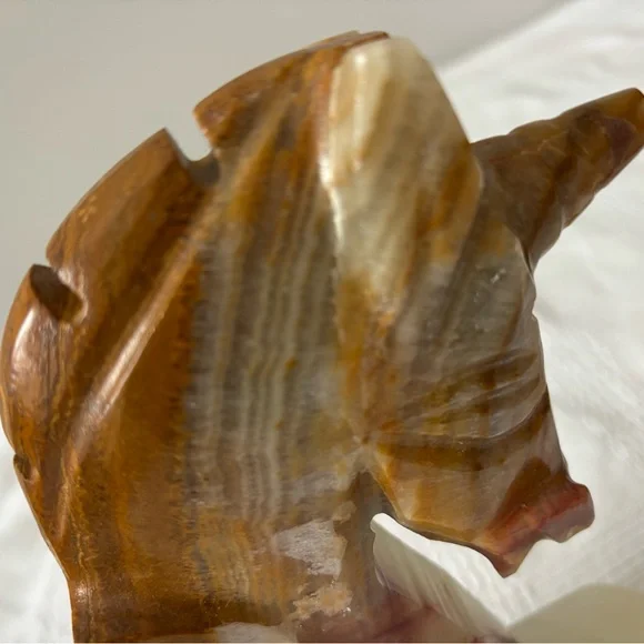 Elegant Brown and Cream Onyx Unicorn Head Bookends